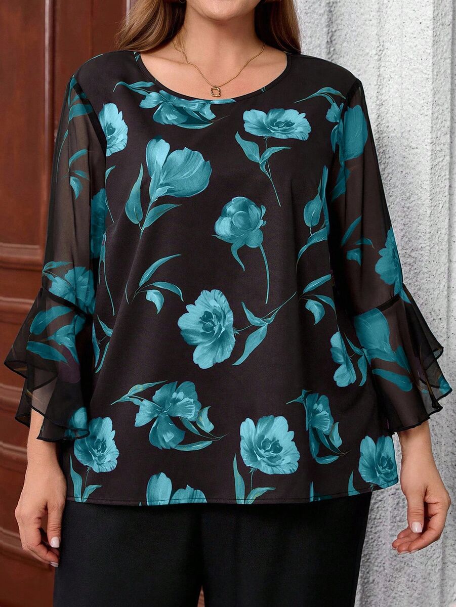 Melna blūze ar tirkīza krāsas ziediem, lielie izmēri i-veikalā jandase.lv