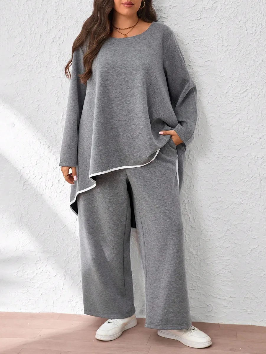 Pelēks kostīms ar baltu apdari, lielie izmēri i-veikalā jandase.lv