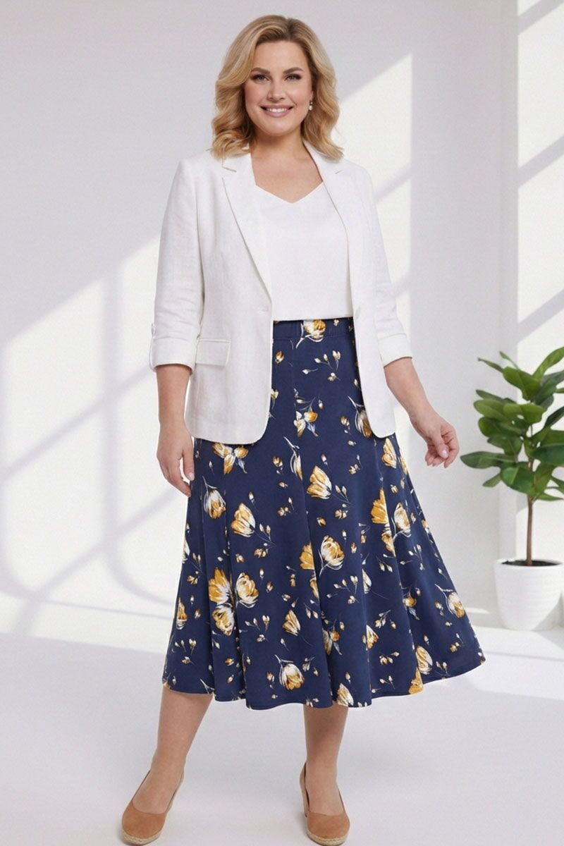 Tumši zili svārki ar dzelteniem ziediem, lielie izmēri i-veikalā jandase.lv