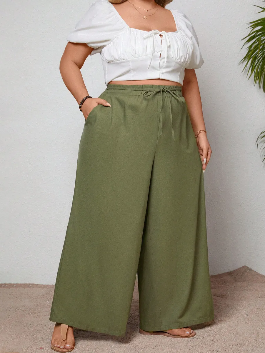 Haki krāsas bikses ar sasienamu jostiņu, lielie izmēri i-veikalā jandase.lv