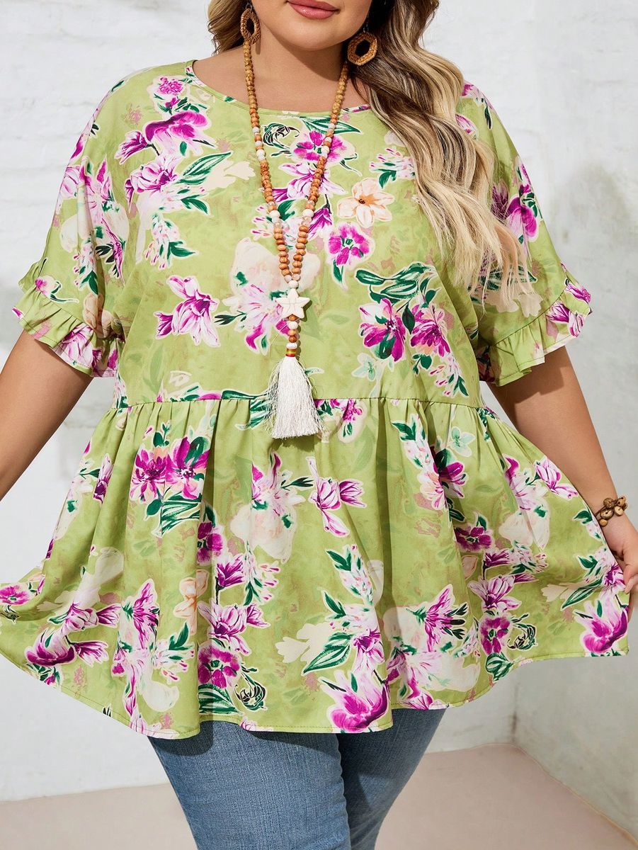 Zaļa tunika ar krāsainiem ziediem, lielie izmēri i-veikalā jandase.lv